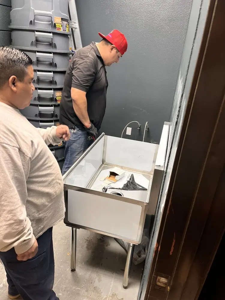 Commercial plumbing and sink installation in Hays